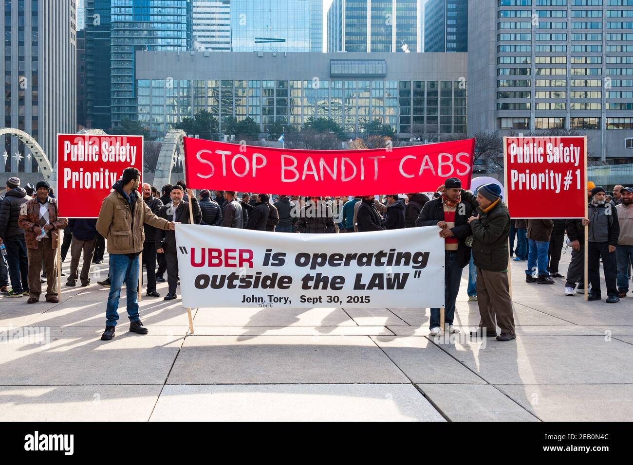 Toronto taxi drivers protest against Uber and the city lack of bylaws enforcement regarding the rival company. The protest blocked the intersection of Stock Photo