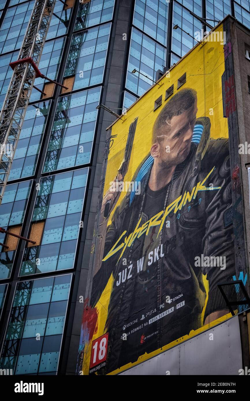 Warsaw, Poland - December 9, 2020: Advertisement of Cyberpunk 2077 roleplaying game by CD PROJEKT RED in form of mural by Good Looking Studio in capit Stock Photo