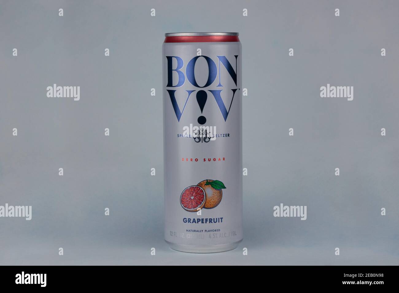 can of Bon Viv brand spiked seltzer, hard seltzer water with alcohol added, a popular beverage, on a pale blue background Stock Photo