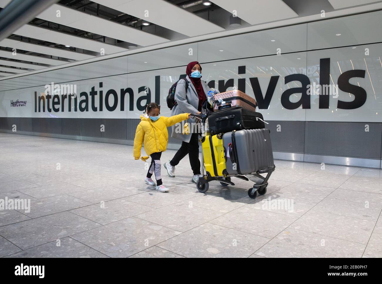 London, UK. 11th Feb, 2021. International Arrivals at Heathrow Terminal 5. People arriving in England from "red list" countries, including UK residents, must isolate for 10 days in hotels, costing £1,750 from February 15th. Health Secretary made the announcement in the House of Commons on FEbraury 10th. Credit: Mark Thomas/Alamy Live News Stock Photo