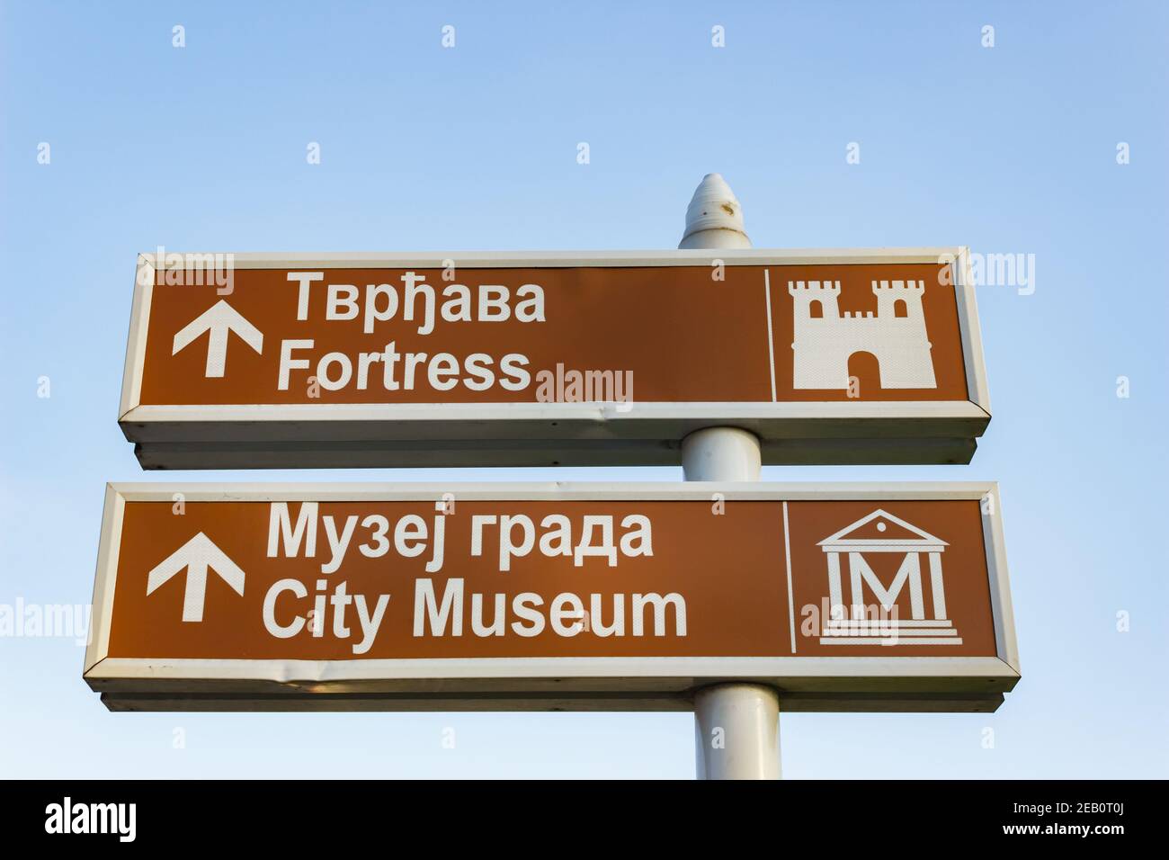 Information street sign indicating the direction of tourist places ...