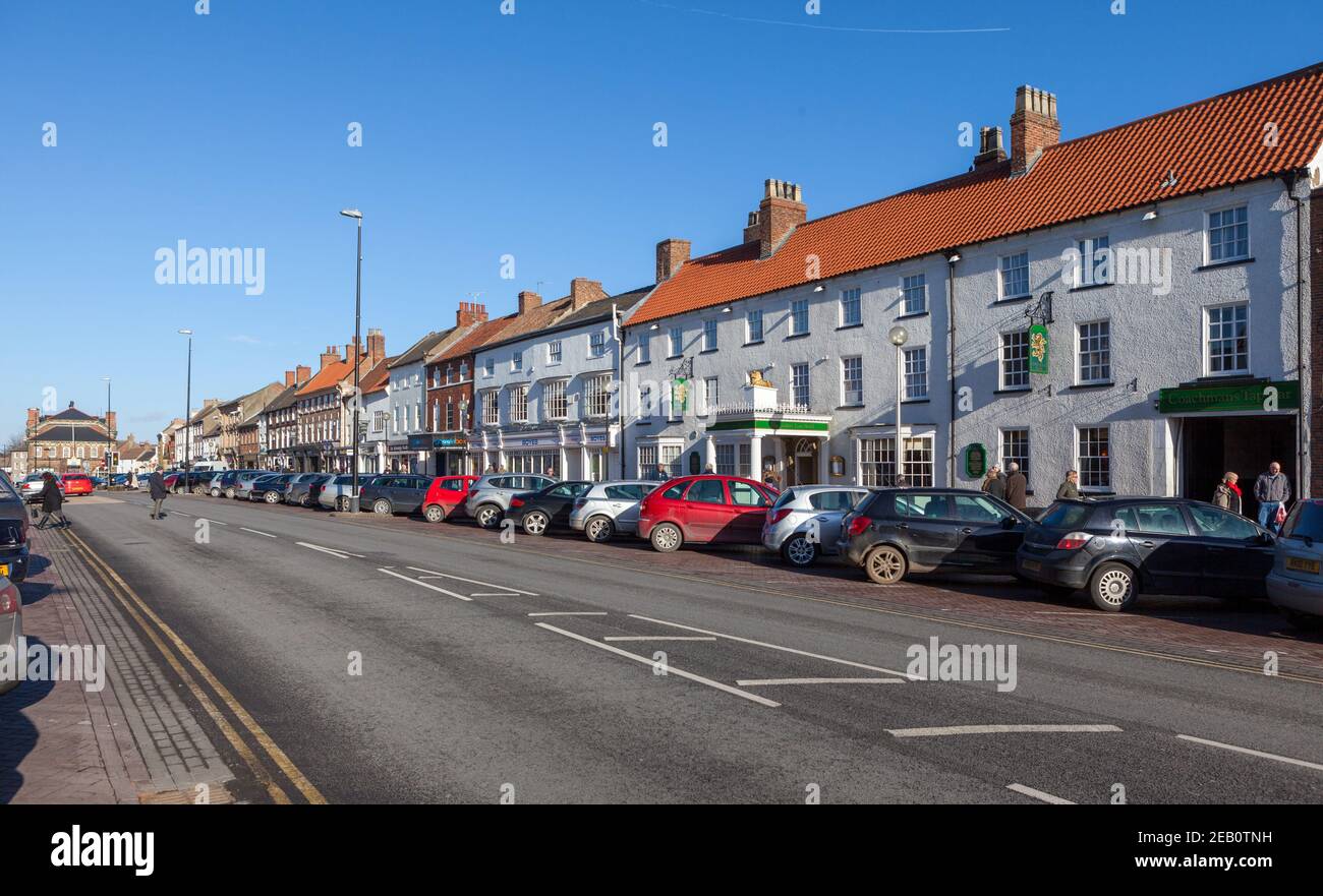 View along Northallerton High Street towards the town hall on a sunny day Stock Photo