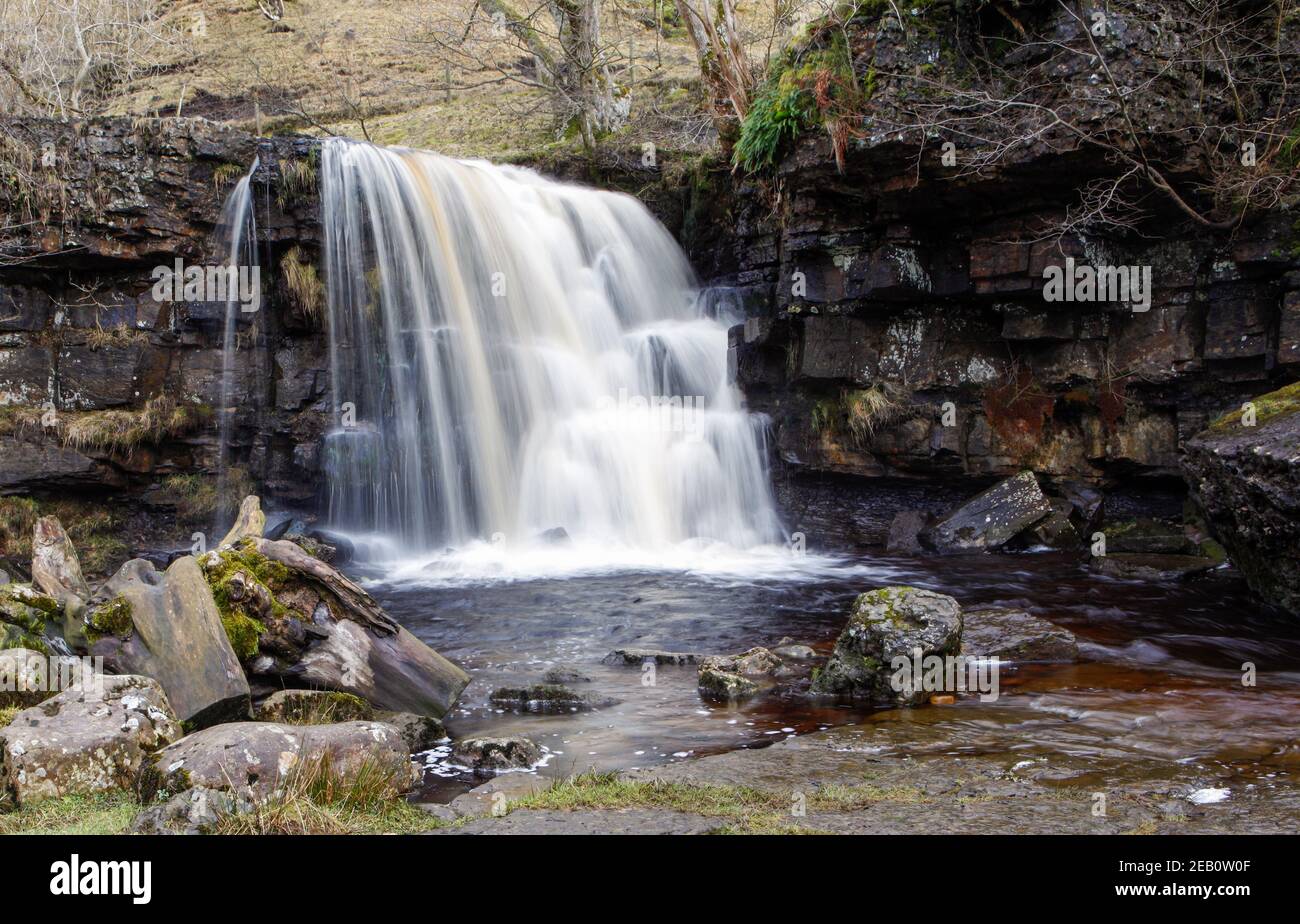 Winter view of East Gill Force a waterfall in Swaledale in the Yorkshire Dales National Park Stock Photo