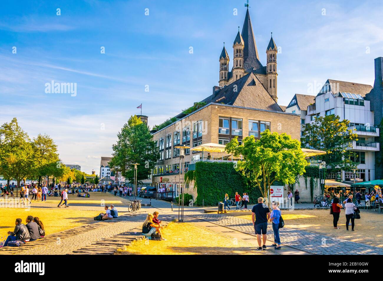 COLOGNE, GERMANY, AUGUST 11, 2018 Riverside promenade and Saint Martin church in Cologne