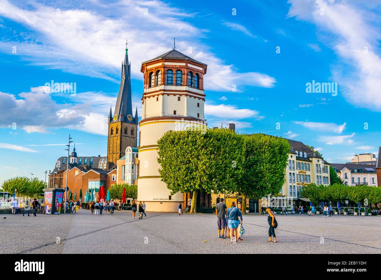 DUSSELDORF, GERMANY, AUGUST 10, 2018: View of Burgplatz with Schifffahrt museum and Saint Lambertus church in Dusseldorf, Germany Stock Photo