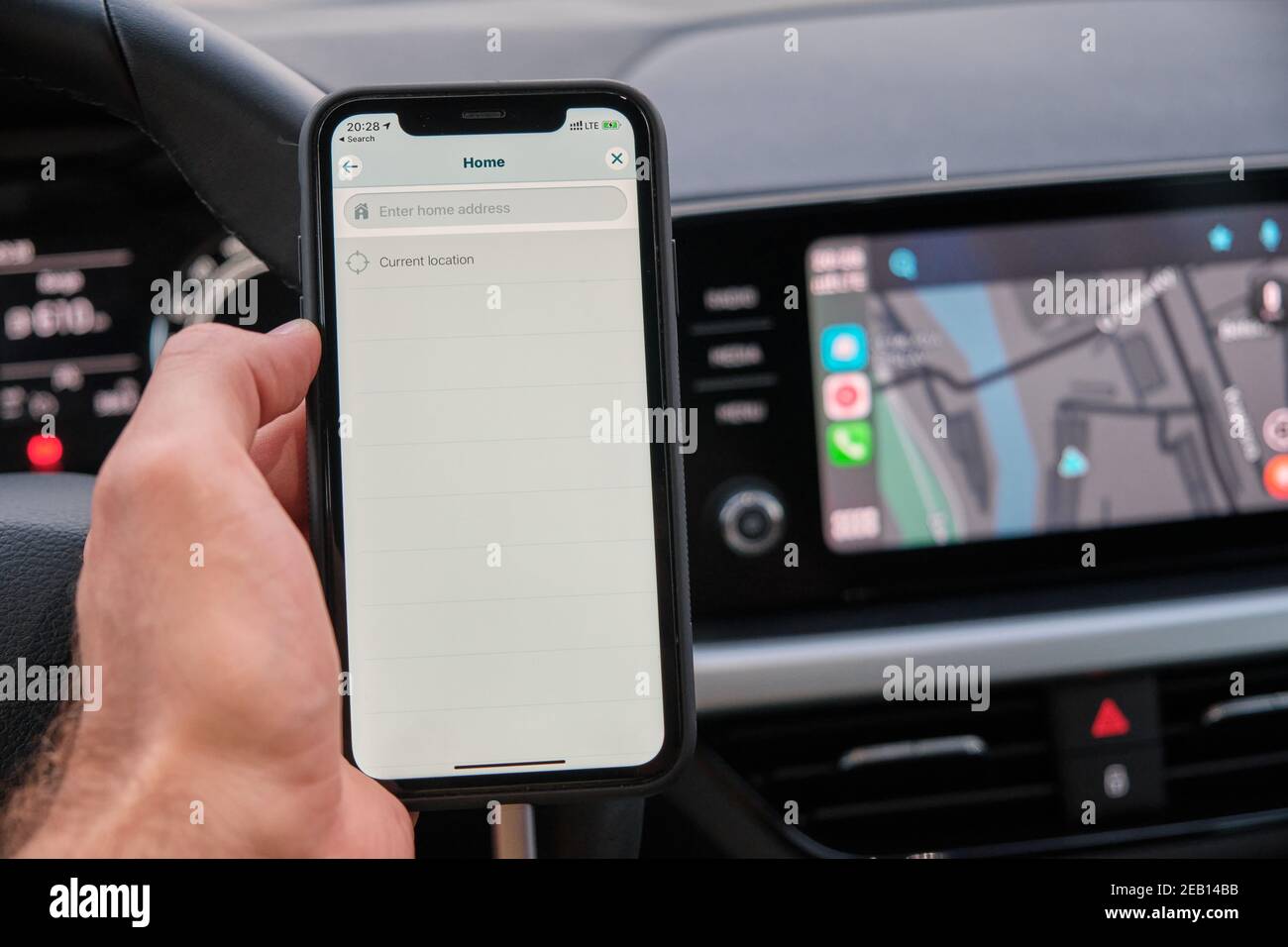 Male hand, iPhone connecting to infotainment system, Apple CarPlay,  display, touchscreen, dashboard, car, Peugeot 308 Stock Photo - Alamy