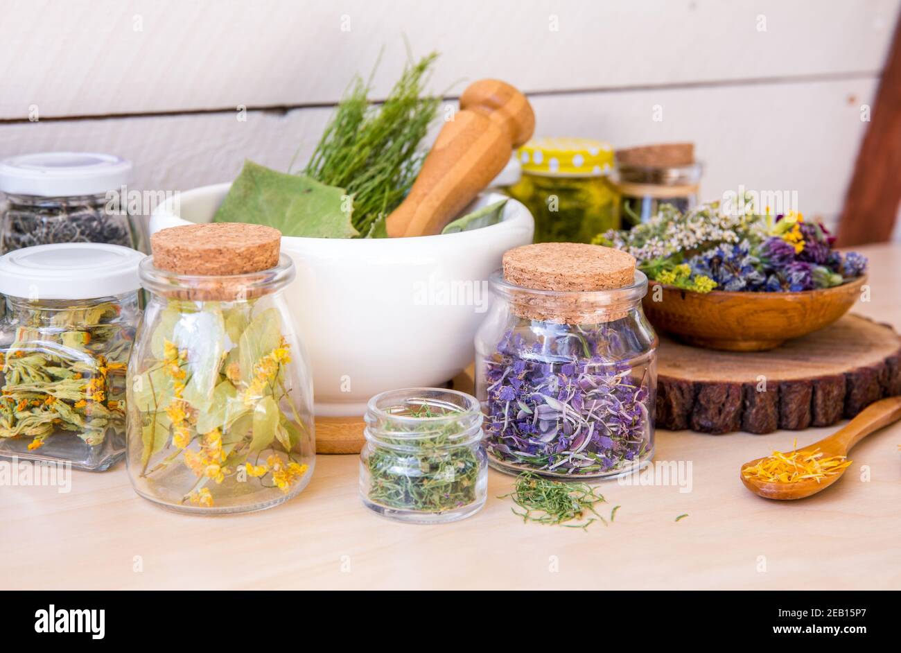 Home herbal apothecary concept. Lot of different dry herbal remedy plants( Chamaenerion angustifolium, Achillea millefolium, Tilia platyphyllos. Stock Photo