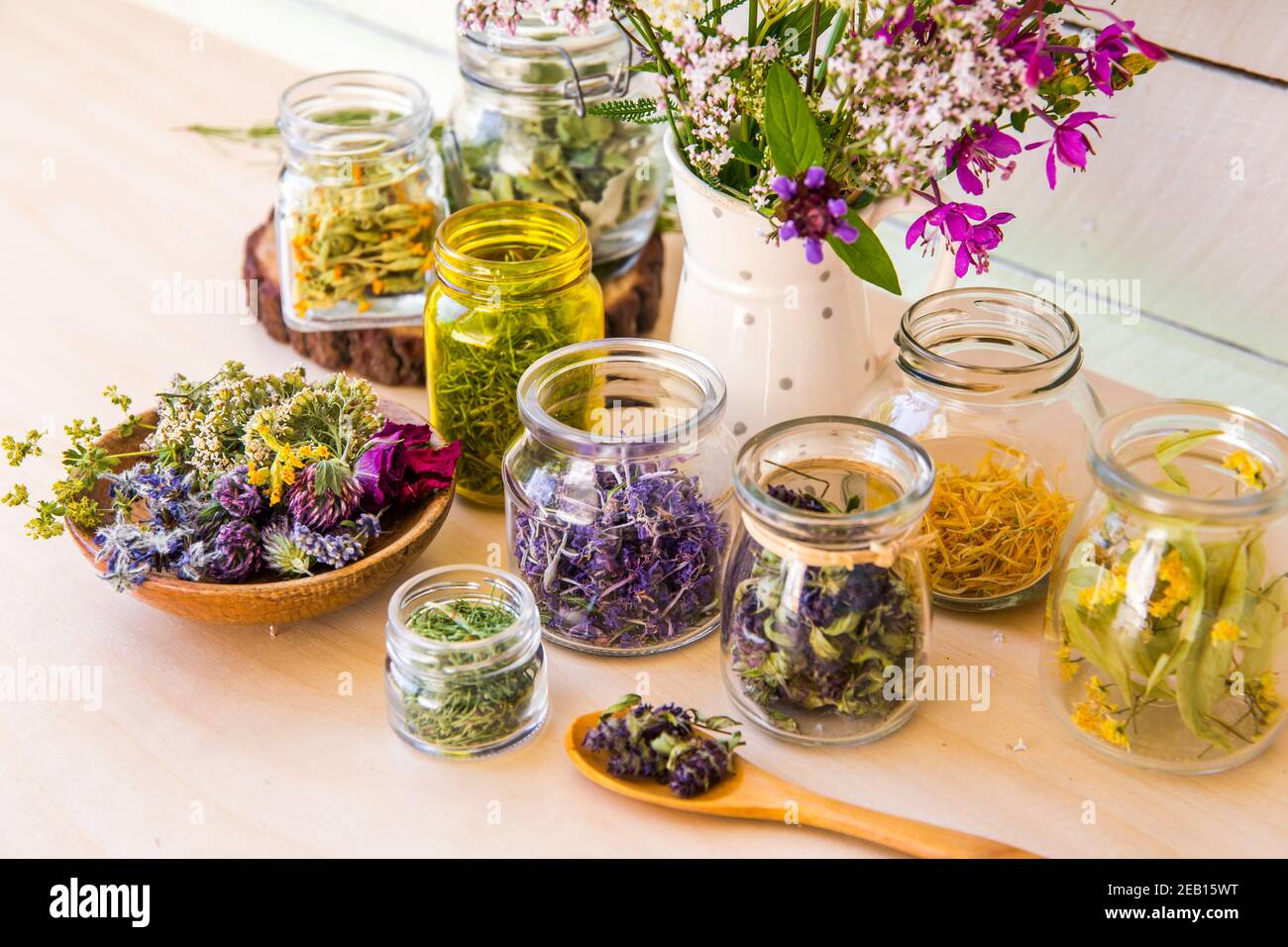 Home herbal apothecary concept. Lot of different dry herbal remedy plants( Chamaenerion angustifolium, Achillea millefolium, Tilia platyphyllos. Stock Photo