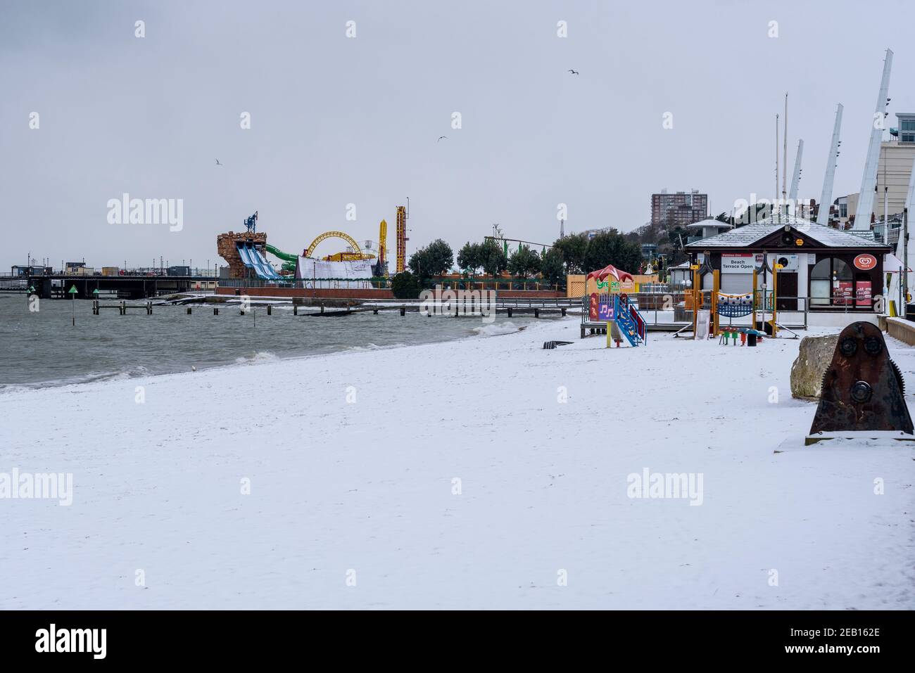 Jubilee Beach in Southend on Sea, Essex, UK, with snow from Storm Darcy. Snow covered beach, seafront attractions Stock Photo