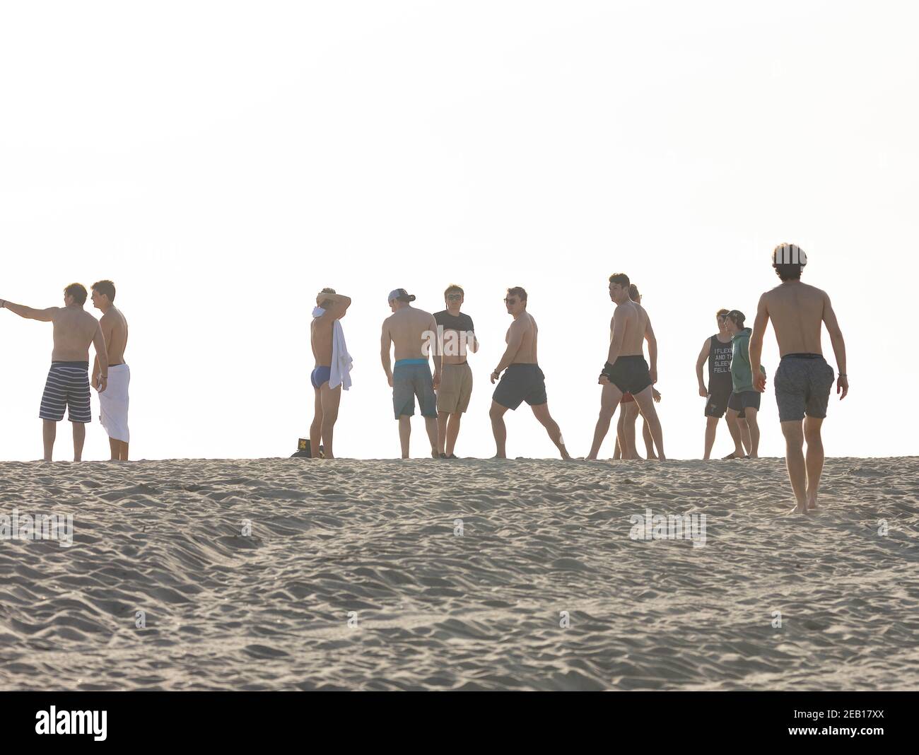 Young men training on the beach in Southern California USA Stock Photo