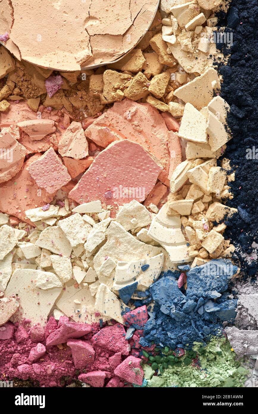 Broken eyeshadows in trendy shades isolated on white background Stock Photo
