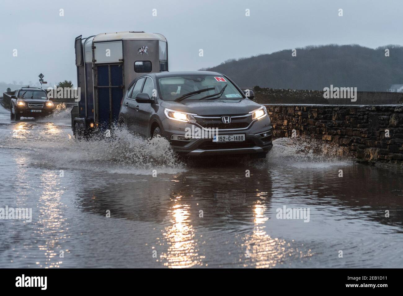 Timoleague, West Cork, Ireland. 11th Feb, 2021. After a day of torrential rain and winter showers, Timoleague flooded at high tide this evening. Credit: AG News/Alamy Live News Stock Photo