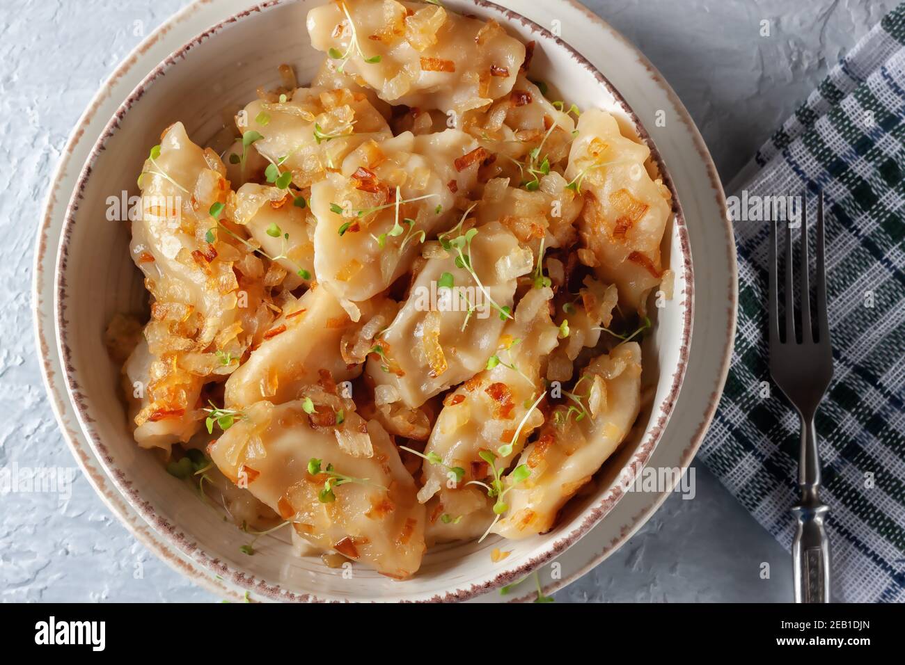 A national dish. Ukrainian dumplings, vareniki, pies fried with onions