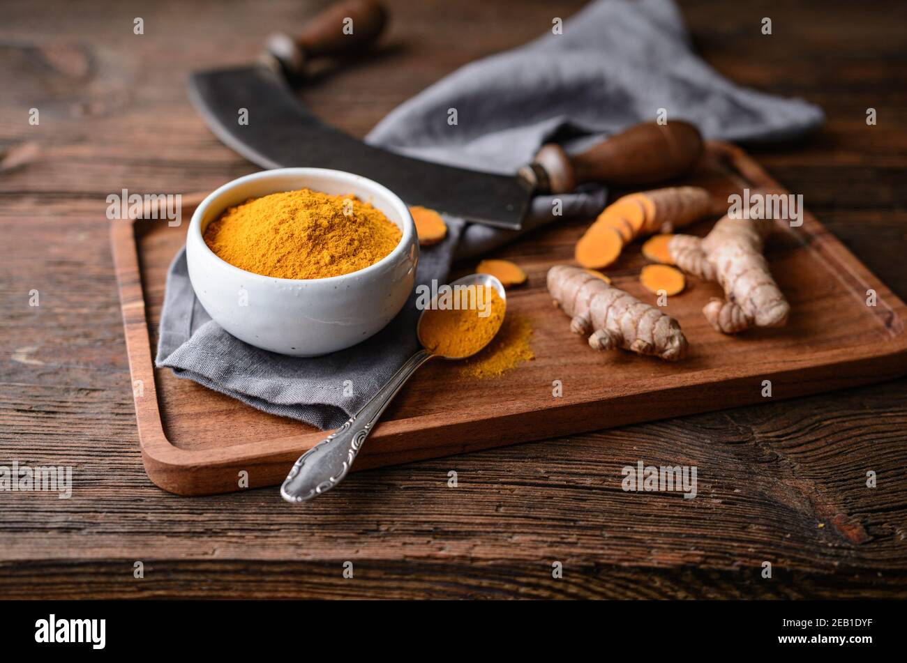 Antiinflammatory food ingredient, turmeric powder in a ceramic bowl