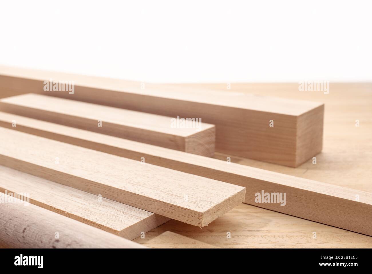Group of assorted wood material like planks, squares, sheets. Timber for carpentry. Copy space Stock Photo