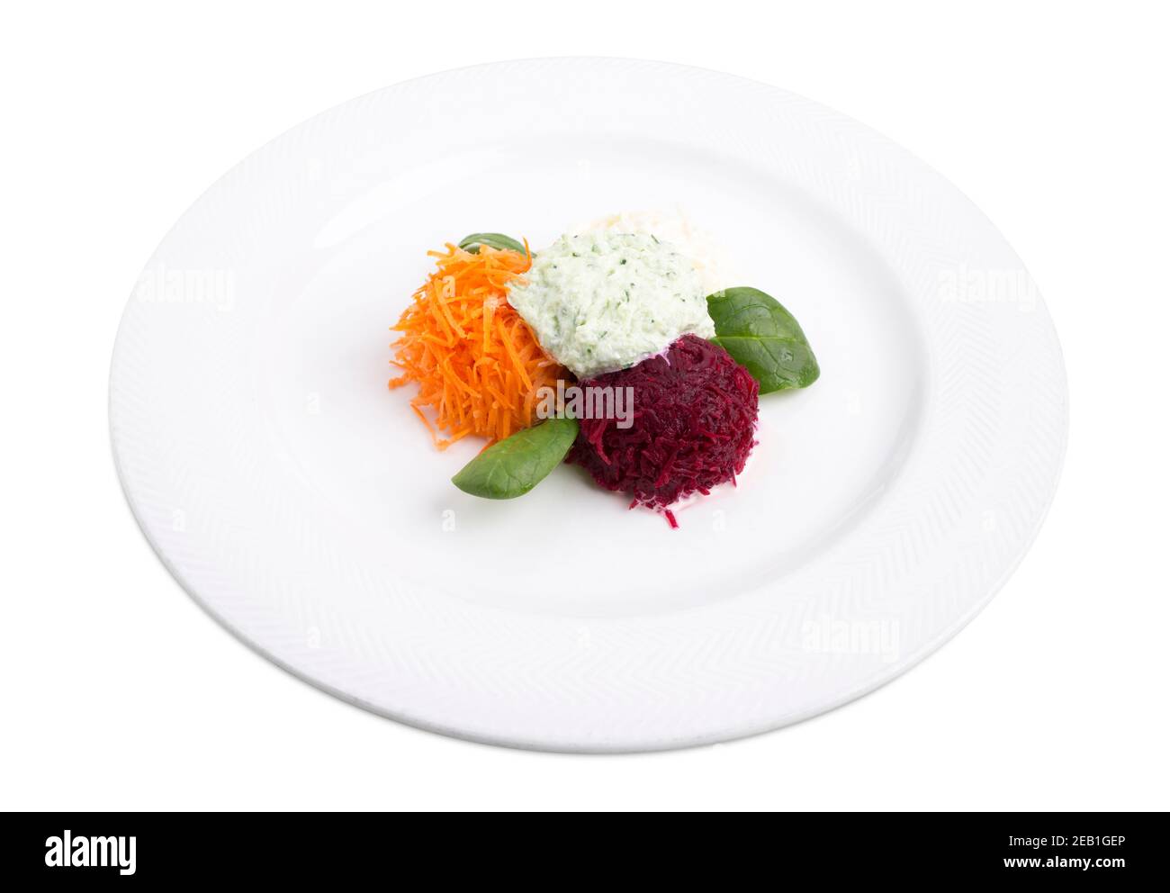 Vegetable salad with beetroot cheese. Isolated on a white background. Stock Photo