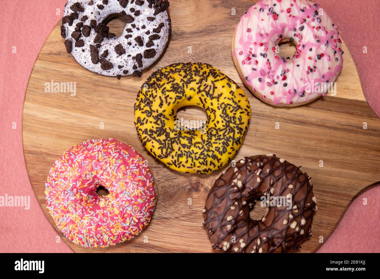Top view of colorful donuts with various flavors Stock Photo - Alamy