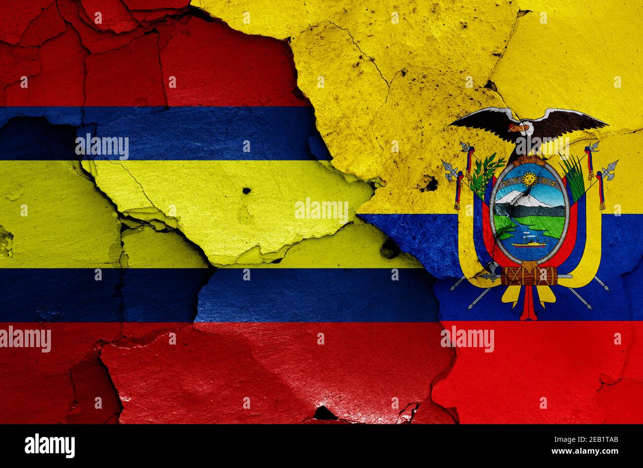flags of Loja and Ecuador painted on cracked wall Stock Photo