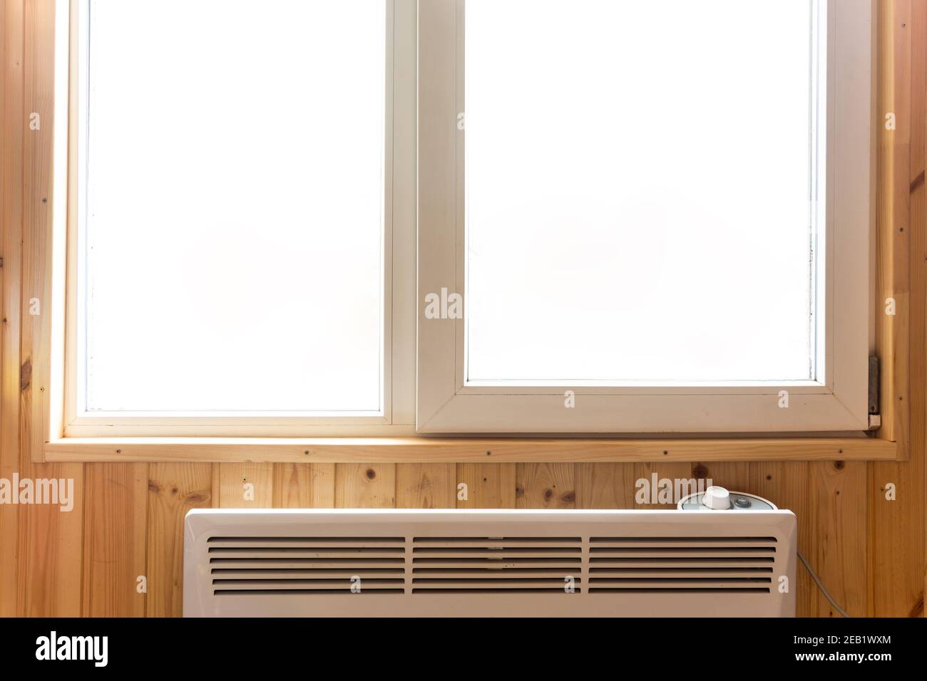 Plastic window installed in a country house, under the window there is ...