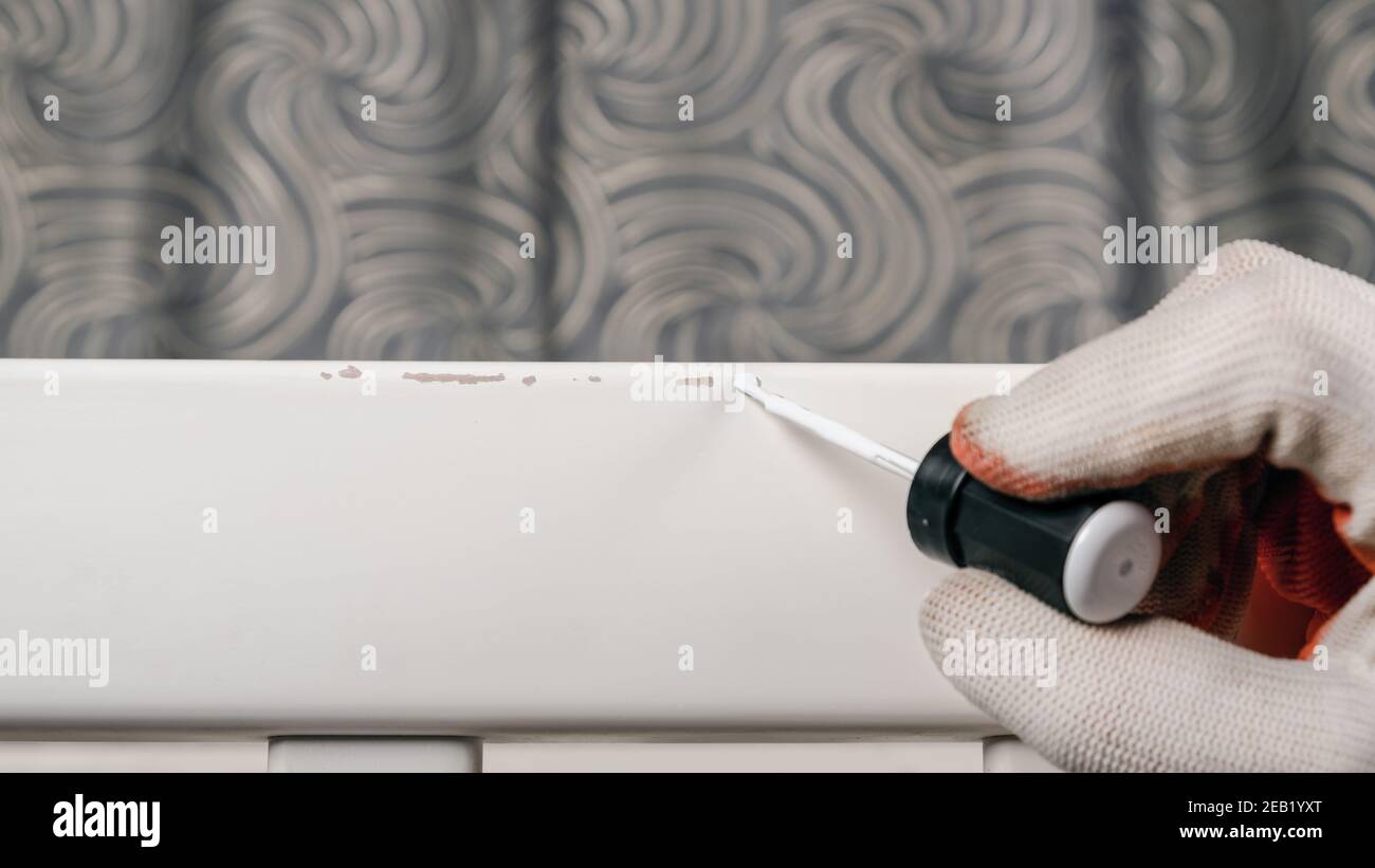 restoration of chipped defects on a crib,furniture repair, varnish