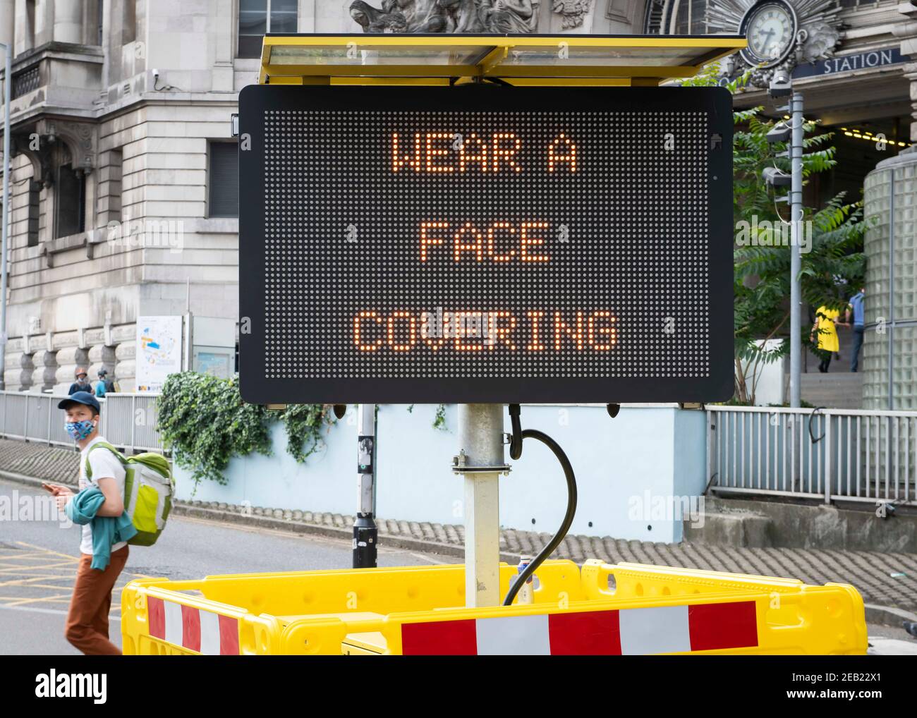 'Wear a Face Mask' is displayed on an electronic sign outside Waterloo ...