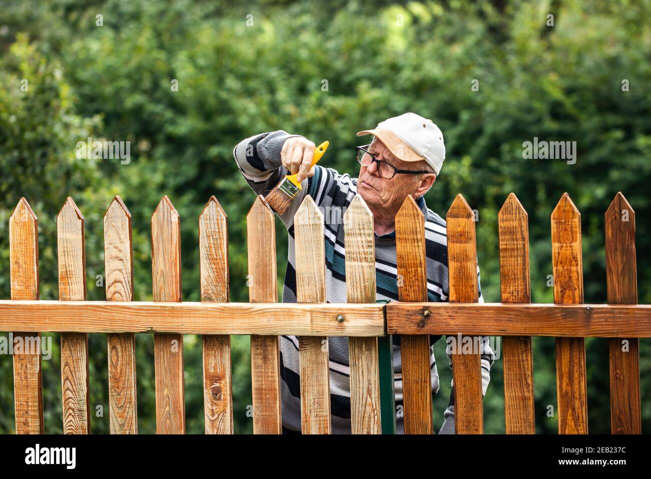 Old man face fence hi-res stock photography and images - Alamy