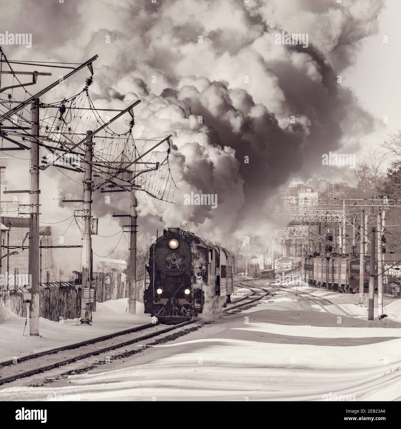 Korolev, Russia - February 23, 2019: Retro train moves at winter day time. Stock Photo