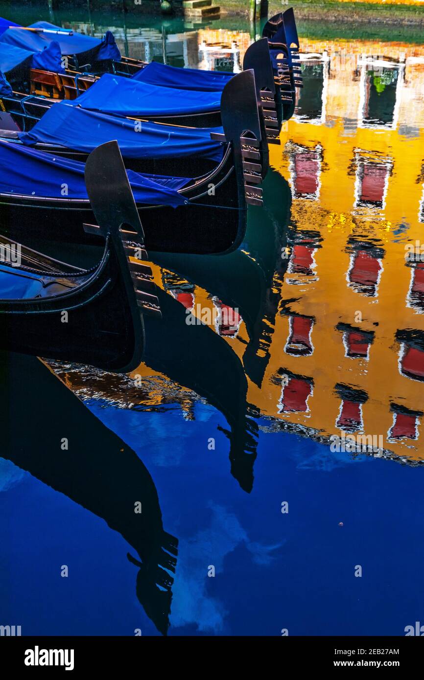 Gondolas and reflections at Bacino Orseolo, Venice Stock Photo