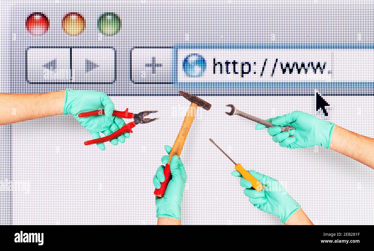 Hands with wrench and other wrench over a internet web browser. concept of fix errors Stock Photo