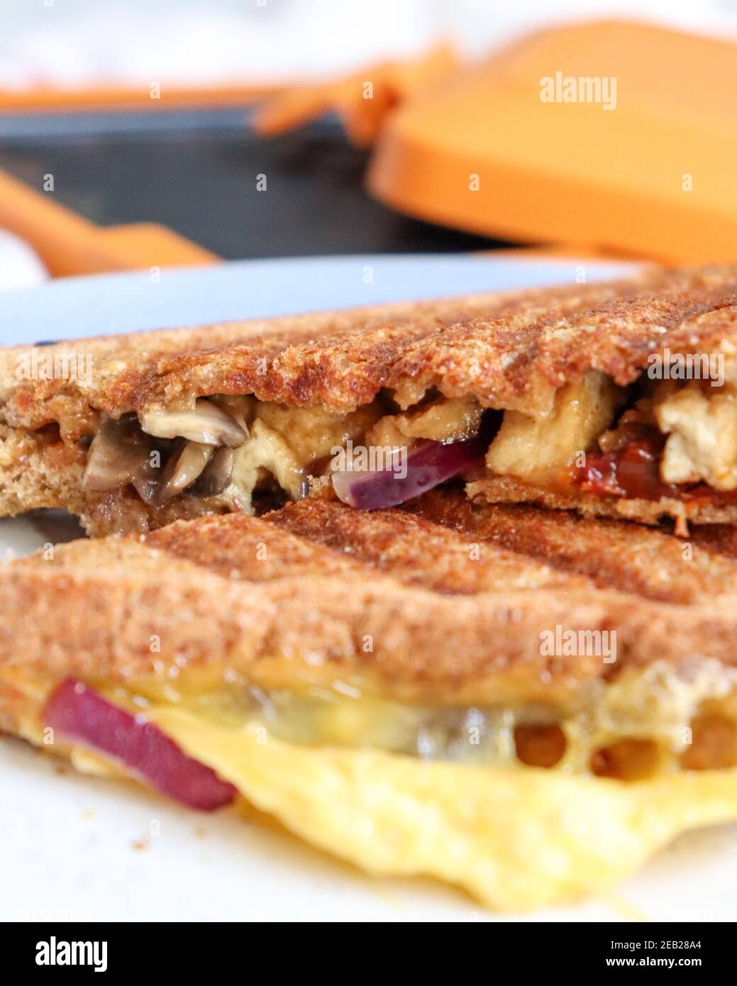 https://c8.alamy.com/comp/2EB28A4/morphy-richards-mico-toastie-toasted-sandwiches-microwave-cookware-kitchen-food-preparation-cooking-snack-grilled-sandwich-ve-2EB28A4.jpg