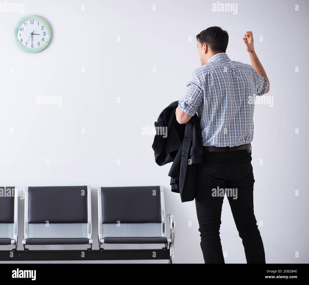 The man nervously impatiently waiting in the lobby Stock Photo - Alamy