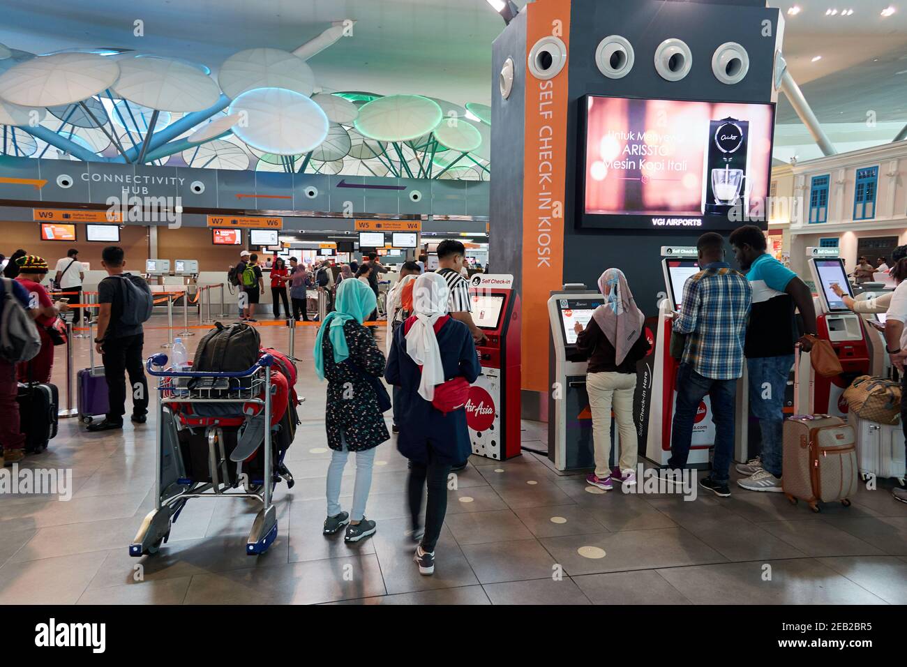 Self check-in terminals at Kuala Lumpur International Airport 2 also known simply as KLIA2, Malaysia Stock Photo