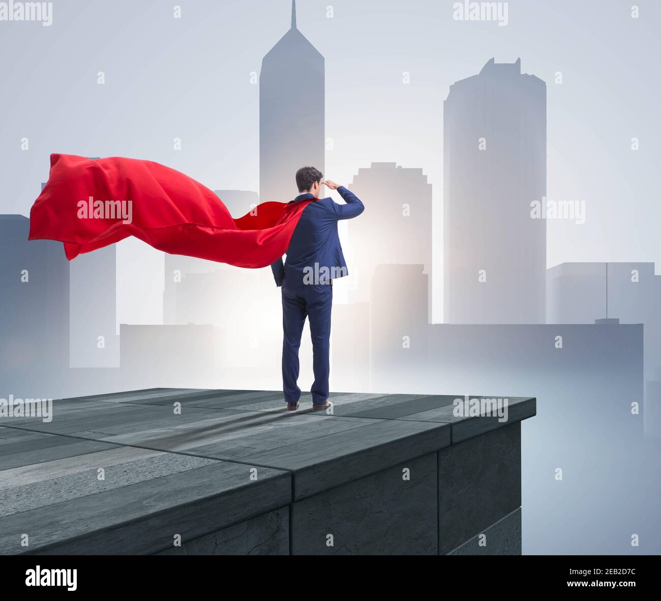 The super hero businessman on top of building ready for challenge Stock ...