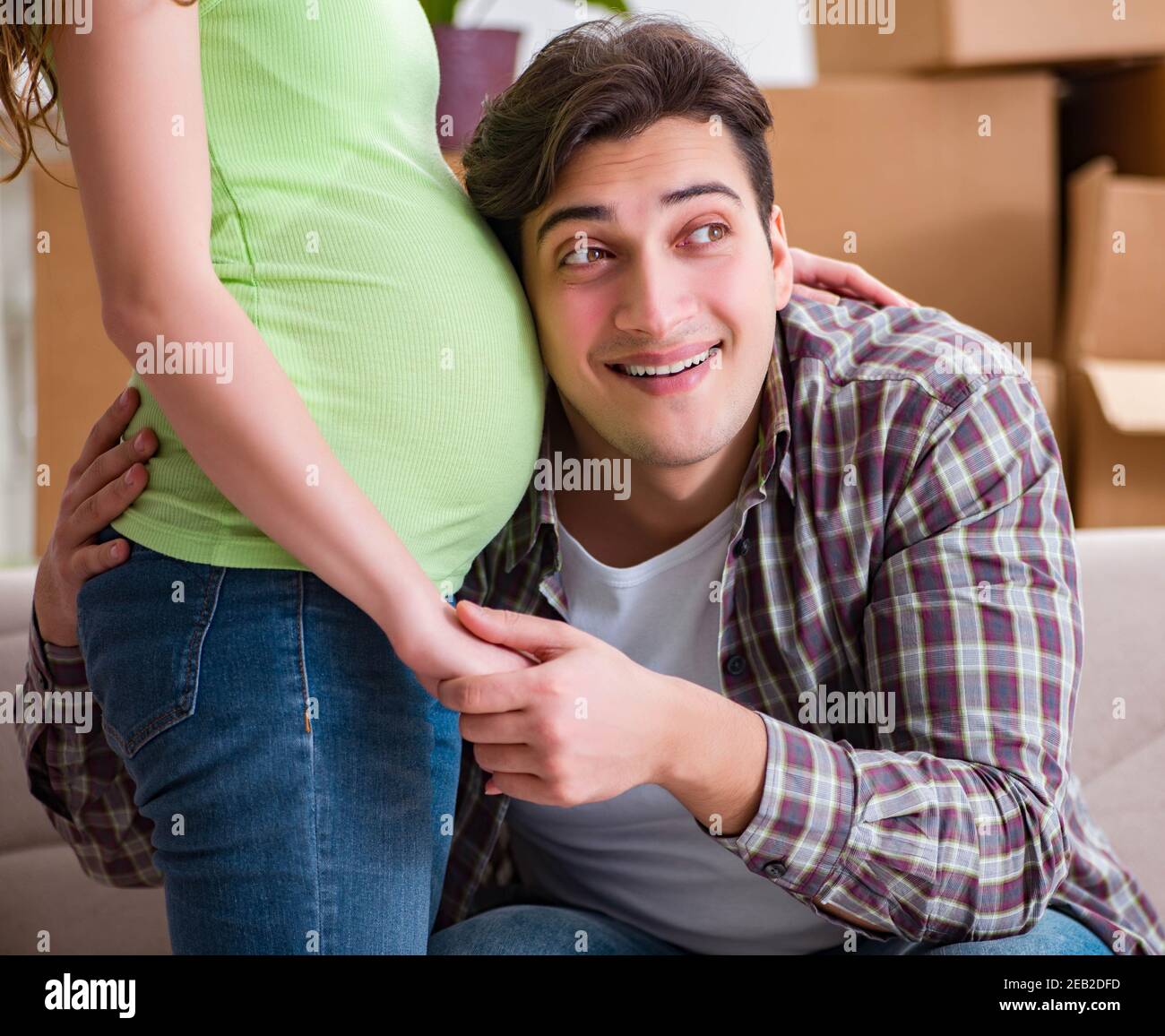 Man Expecting The young couple of man and pregnant wife expecting baby Stock Photo ...