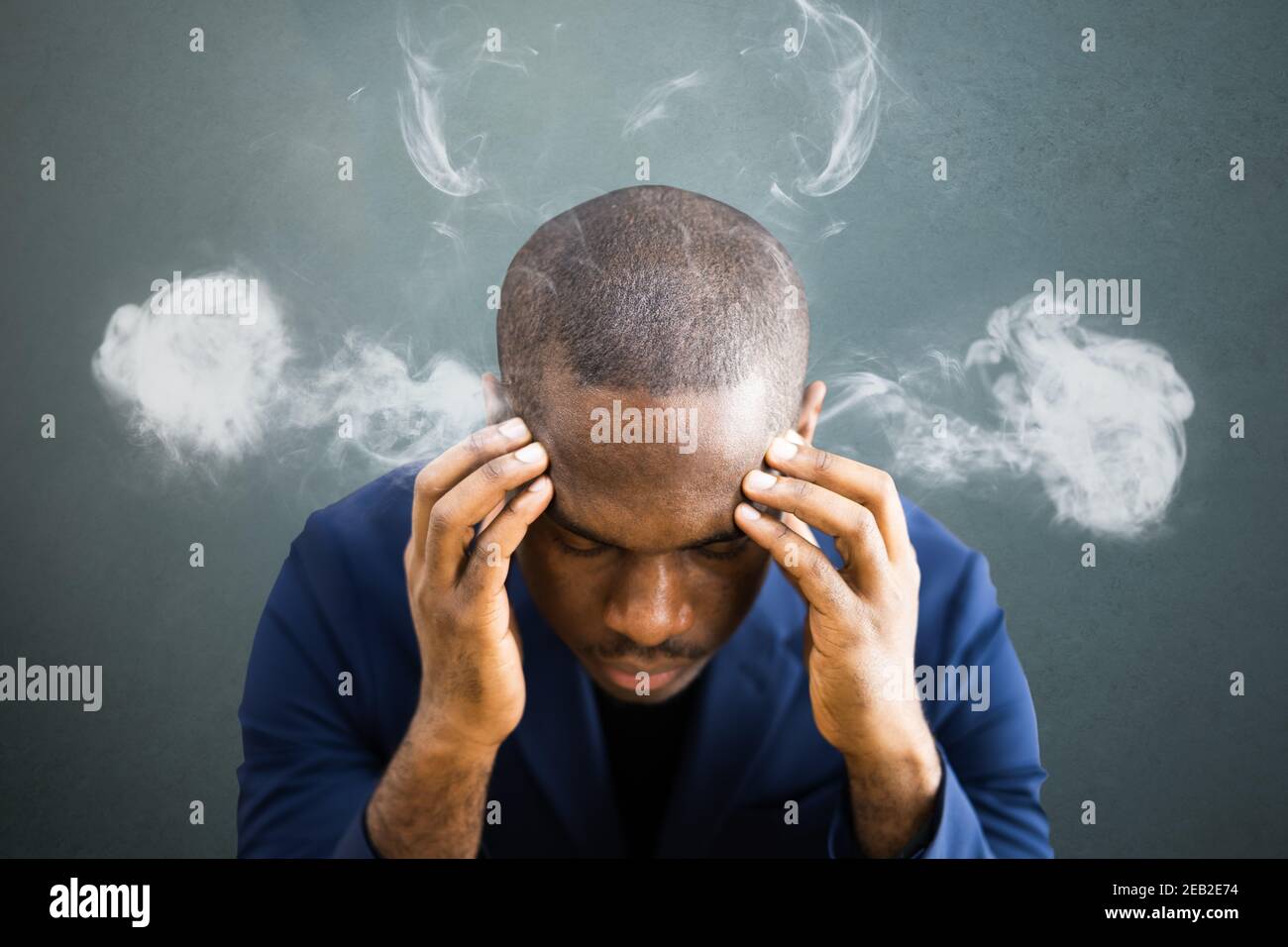 Business Stress Management. Angry Smoking Unhappy Man Stock Photo