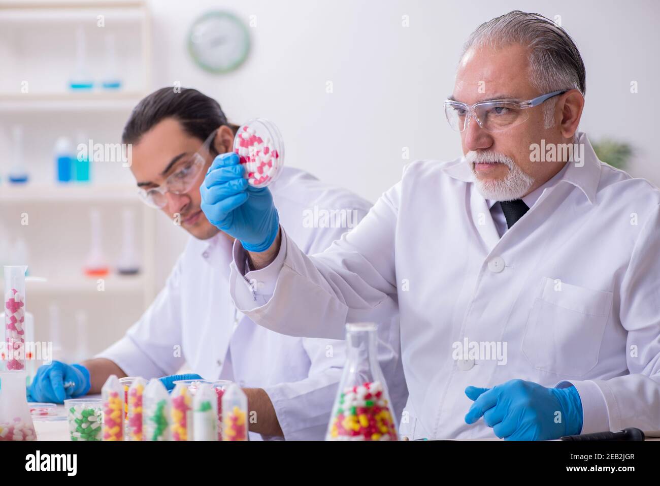 Two chemists working in the laboratory Stock Photo - Alamy