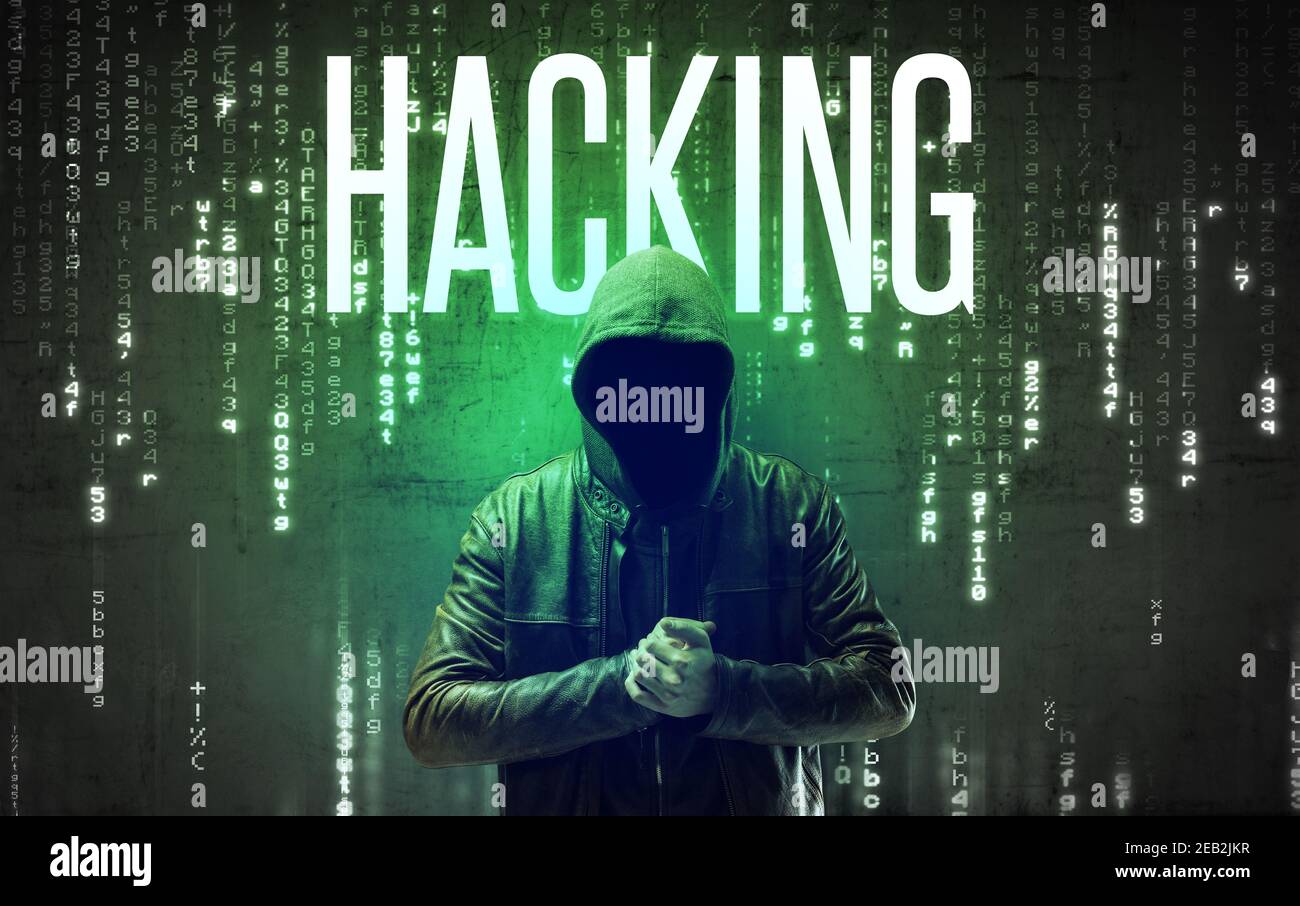Faceless hacker with HACKING inscription, hacking concept Stock Photo