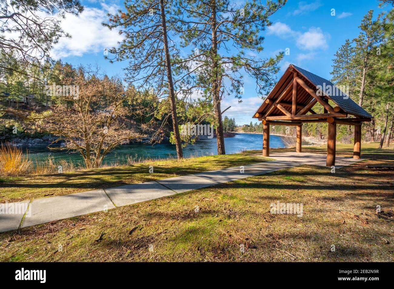 A log gazebo sits in Corbin Park overlooking the Spokane River in Post