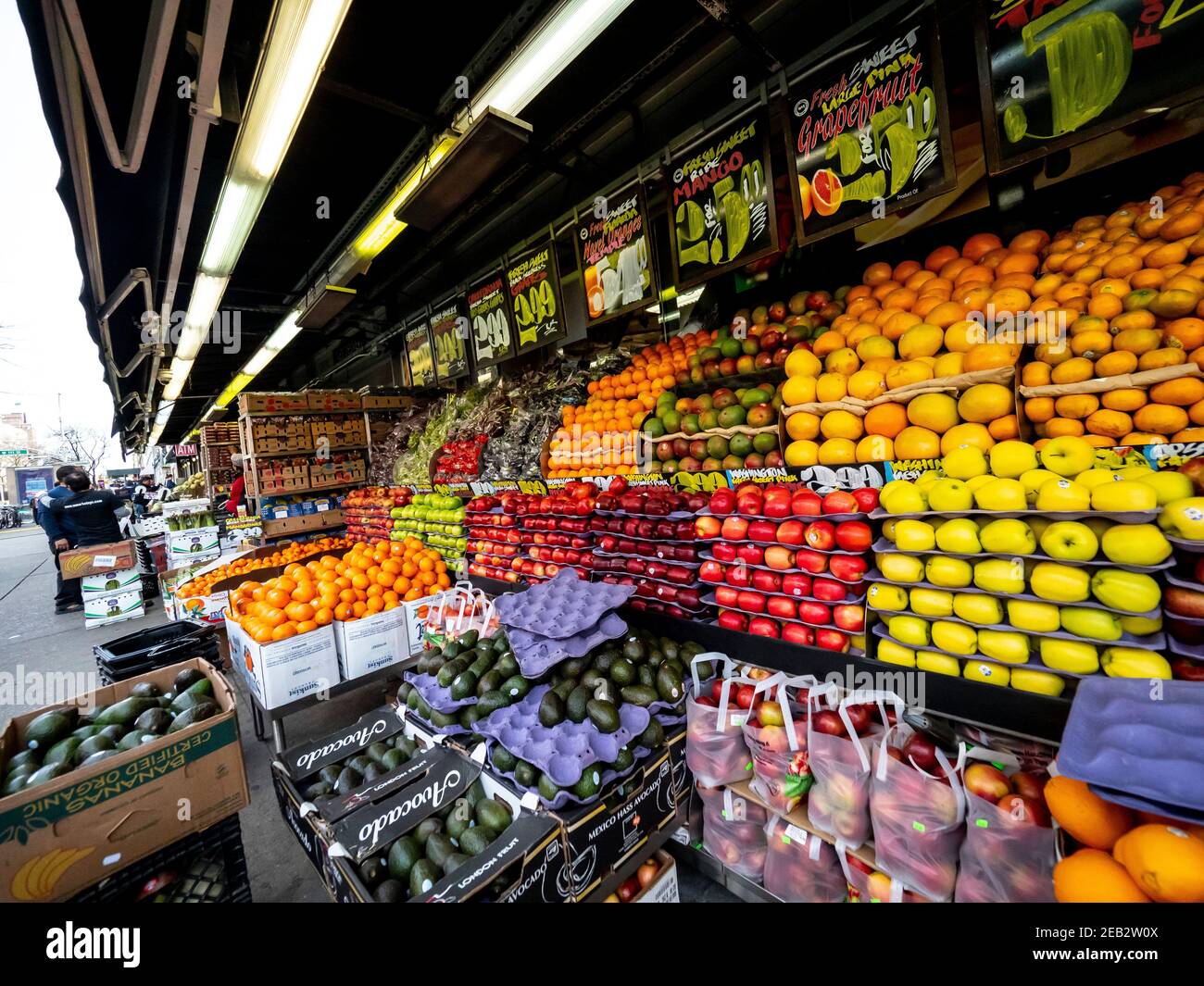 A vegetable and fruit stand at a bodega market in Manhattan New York