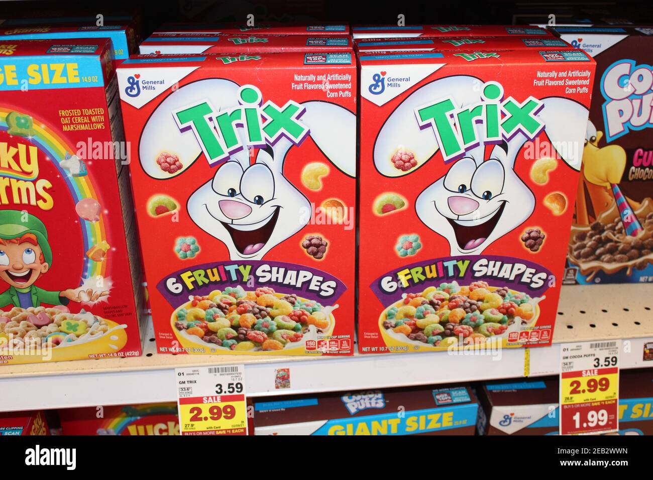 Trix breakfast food cereal shot closeup that's bright and colorful from General Mill's that's on a metal shelf at a grocery store. Stock Photo