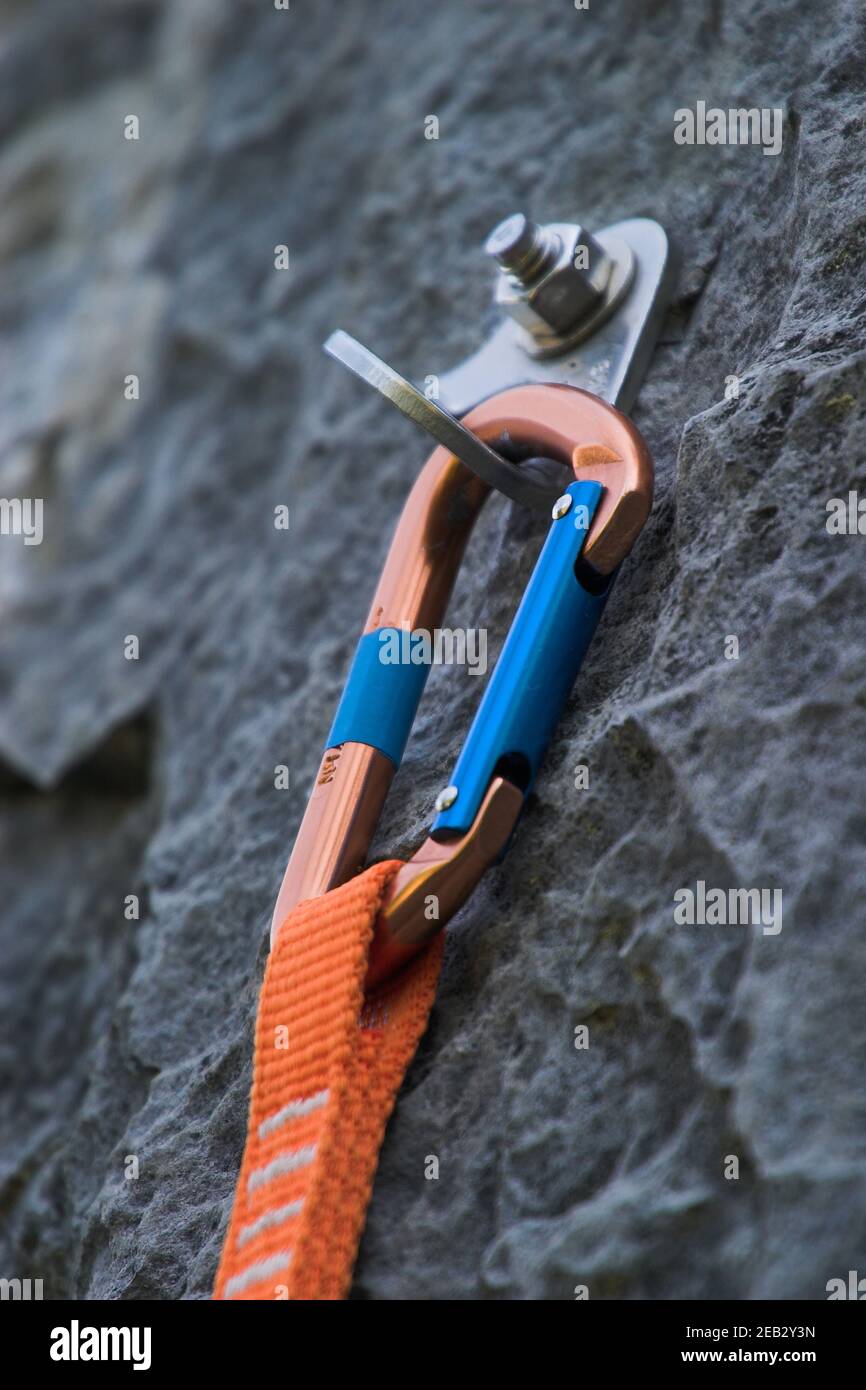 bolt with clipped quickdraw and climbing rope Stock Photo - Alamy
