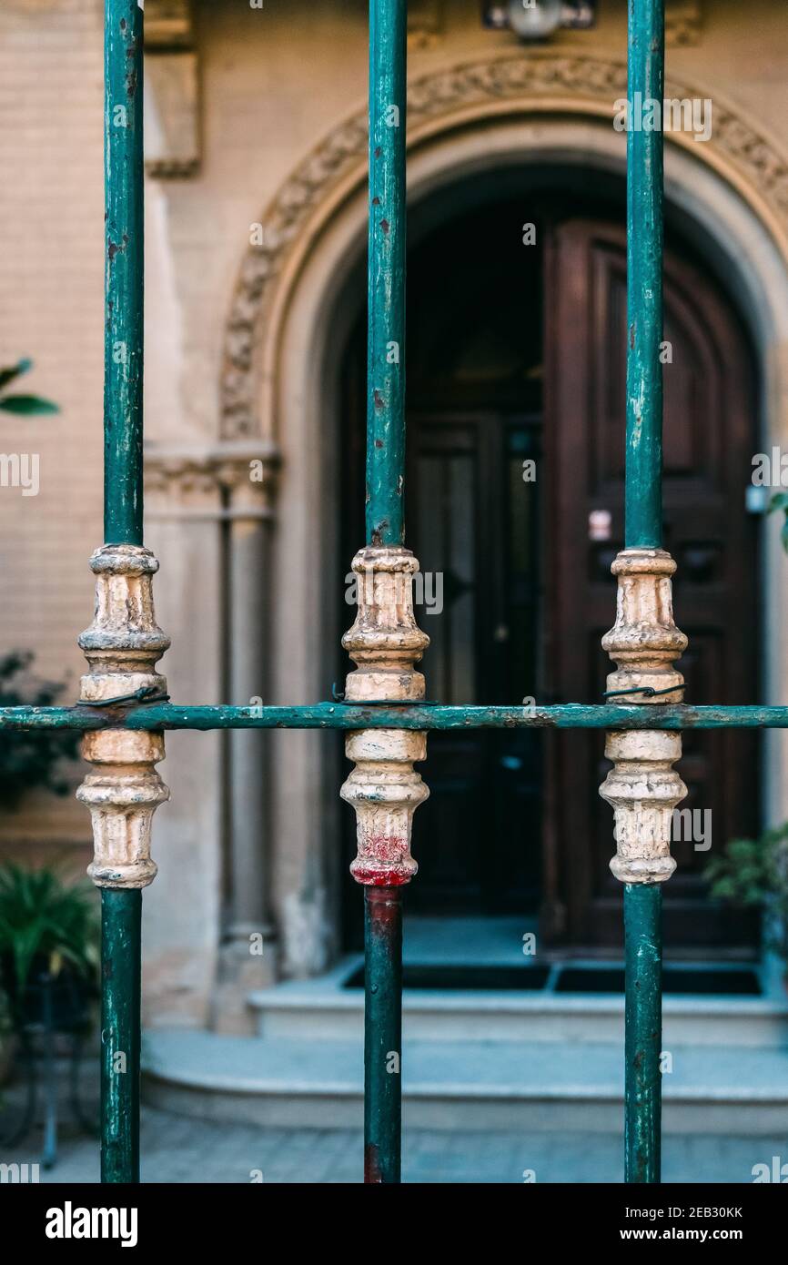Vertical shot of a metal fence with bars in an old house Stock Photo ...