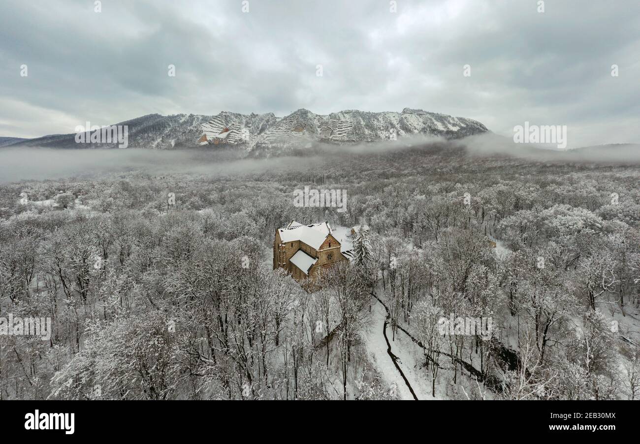 Aerial landscape from Hungar in Bukk Mountains. Scenic view about the Belko mountain andy Belapatfalva town's Cistercian abbey in winter time which co Stock Photo