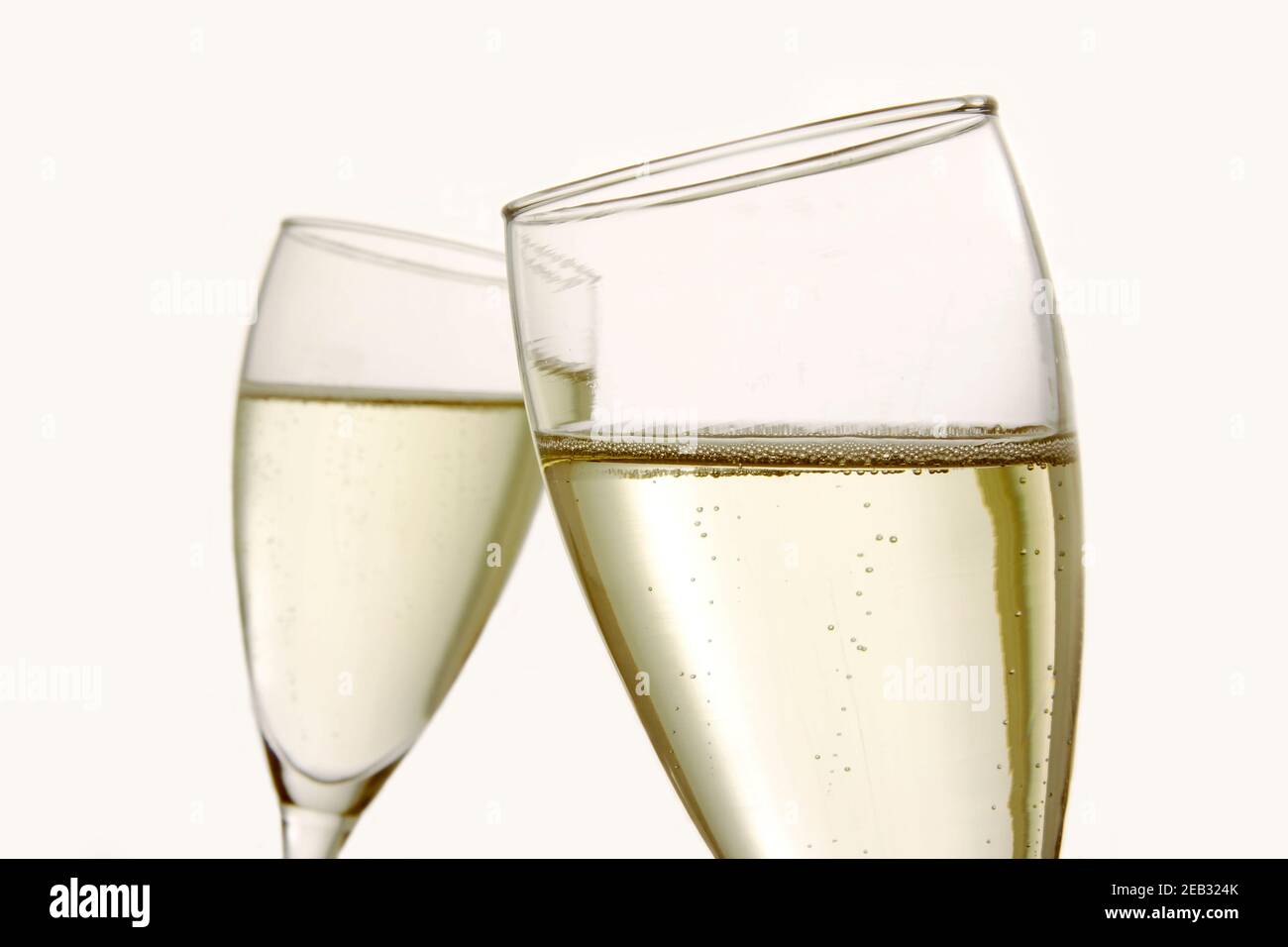 two glasses of champagne on white background Stock Photo