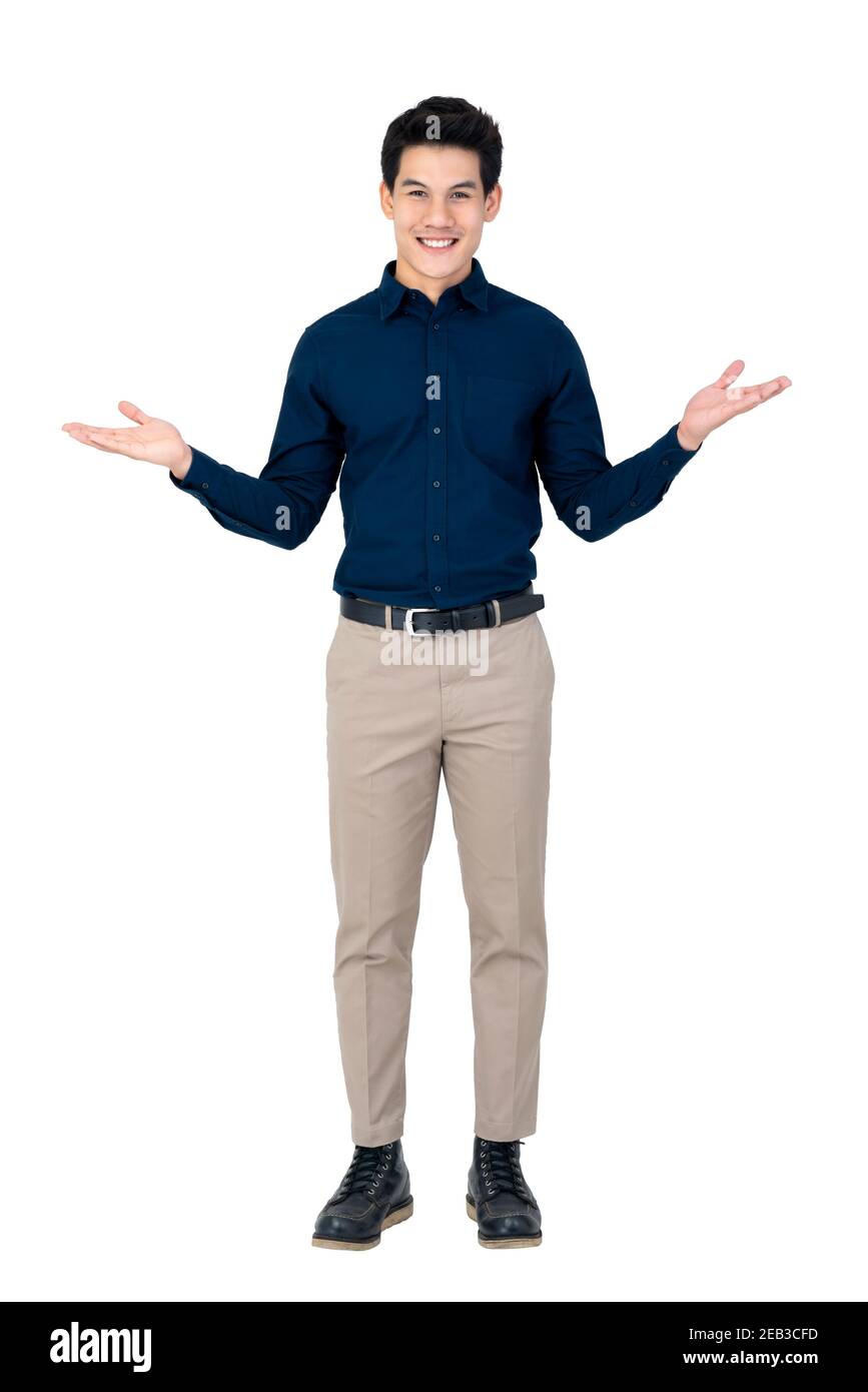 Young smiling handsome Asian man with open palms gesture studio shot isolated on white background Stock Photo