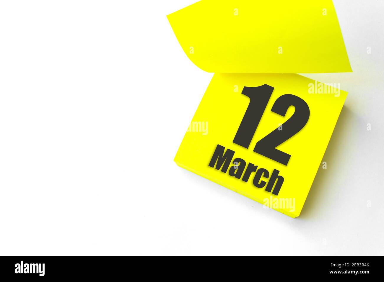 March 12nd. Day 12 of month, Calendar date. Close-Up Blank Yellow paper  reminder sticky note on White Background. Spring month, day of the year  concep Stock Photo - Alamy