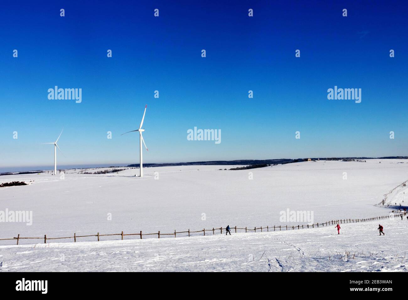 Plateau, snowy mountain meadow, wind turbines Ore Mountains Czech Republic Stock Photo