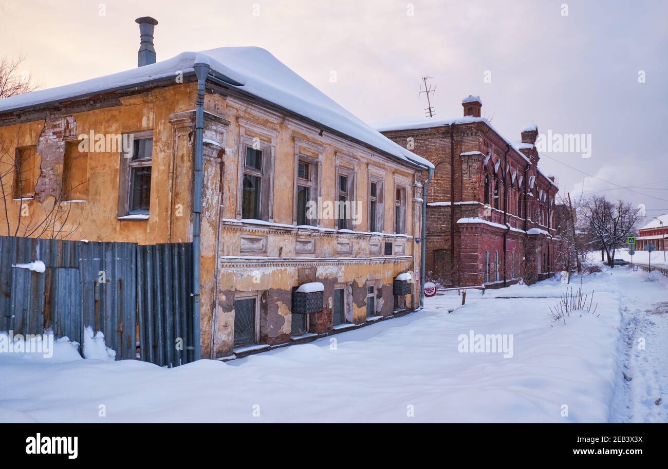 Nizhny Tagil, Russia – January 05, 2021: Old houses on the Uralskaya street - branch of the Museum of Fine Arts (former Mining School) and house of me Stock Photo