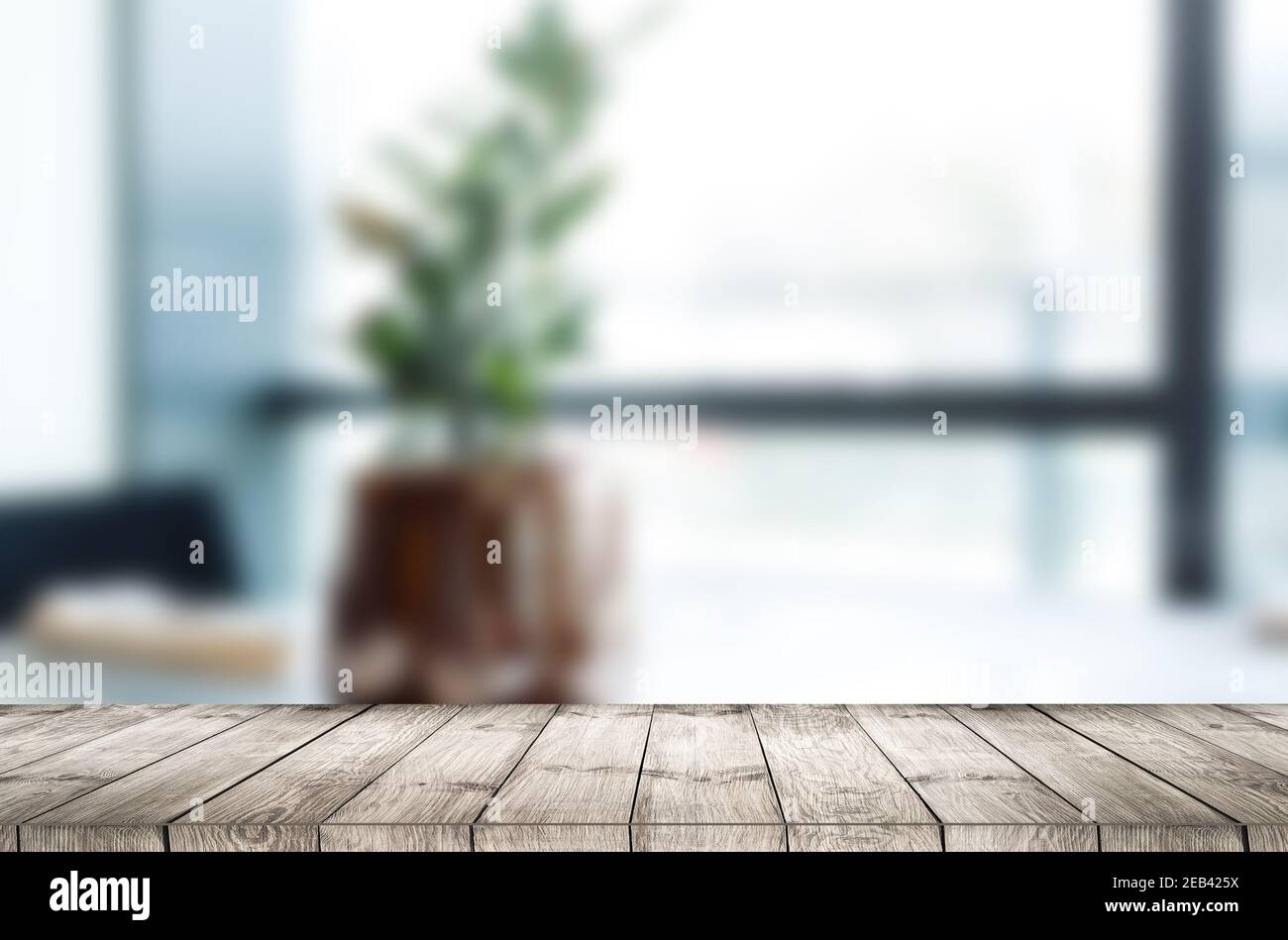 Wooden table and blur restaurant background Stock Photo - Alamy
