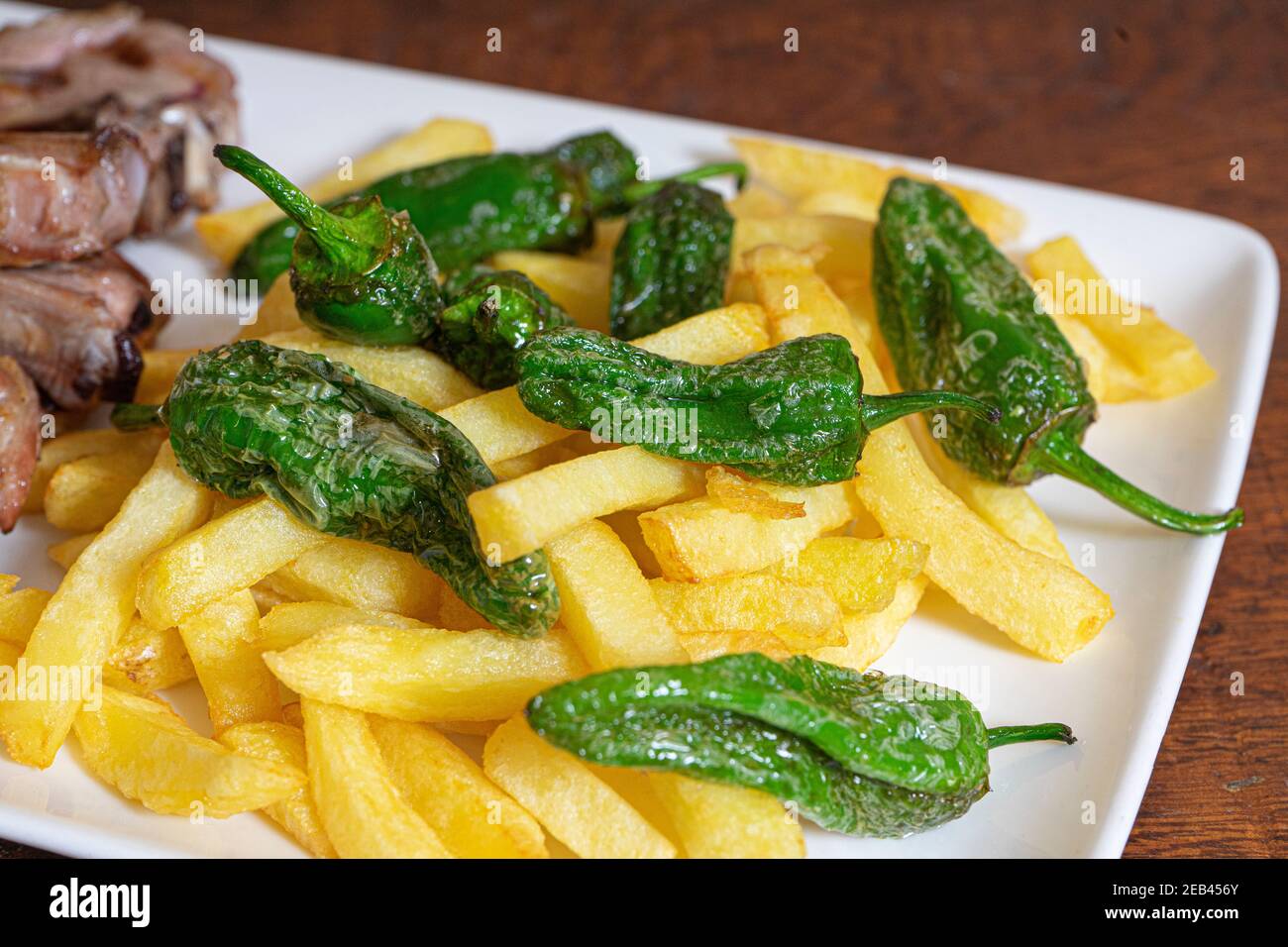 Traditional patatas bravas with peppers Spanish potato appetizer tapas